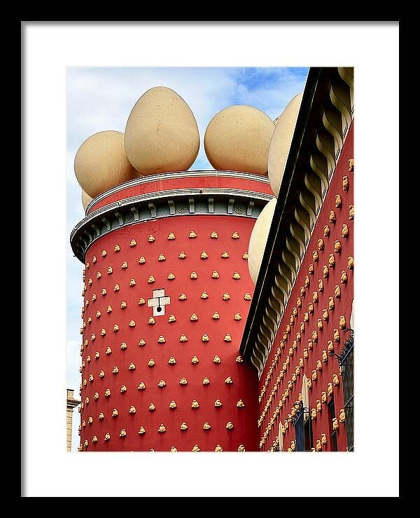 Red tower with golden bread and surreal eggs dali museum travel essayist
