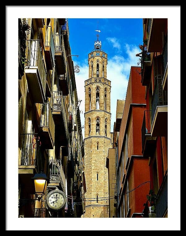 Santa maria del mar tower framed by barcelonas historic streets travel essayist